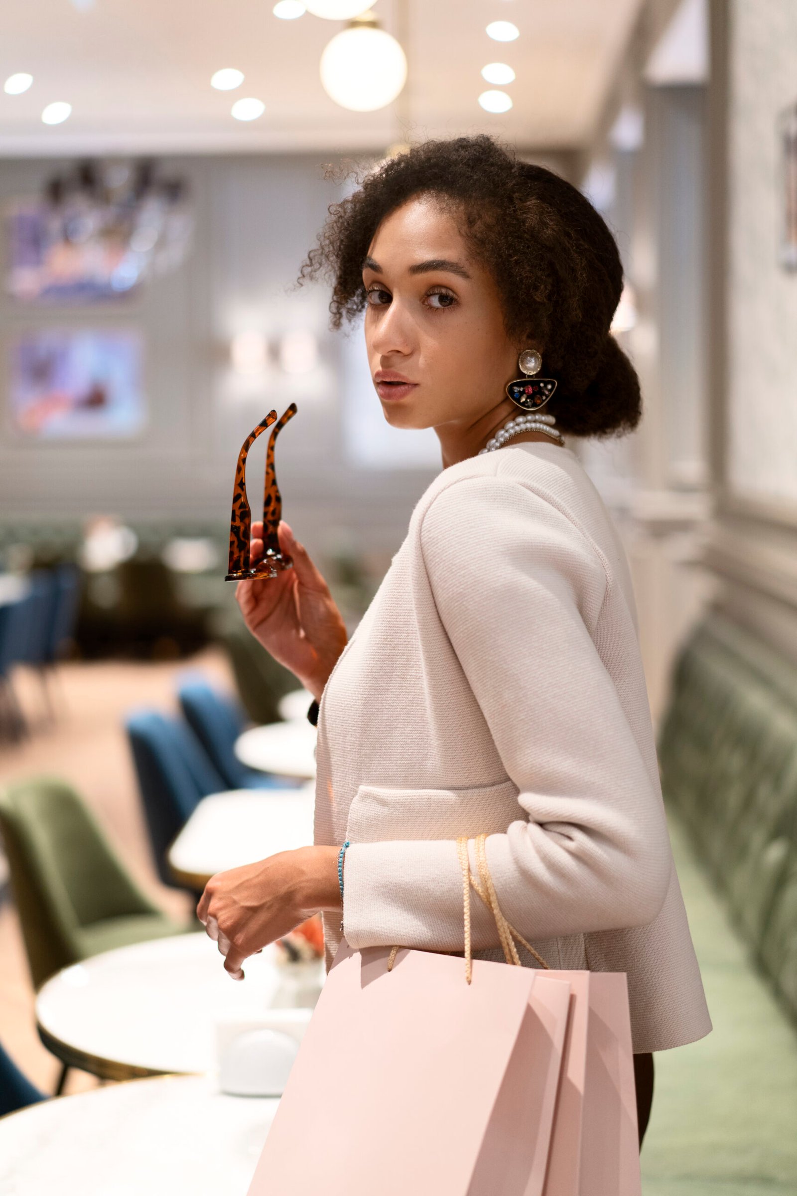 About Jewels by IDL - lady waring jewelry items posing for a photoshhot