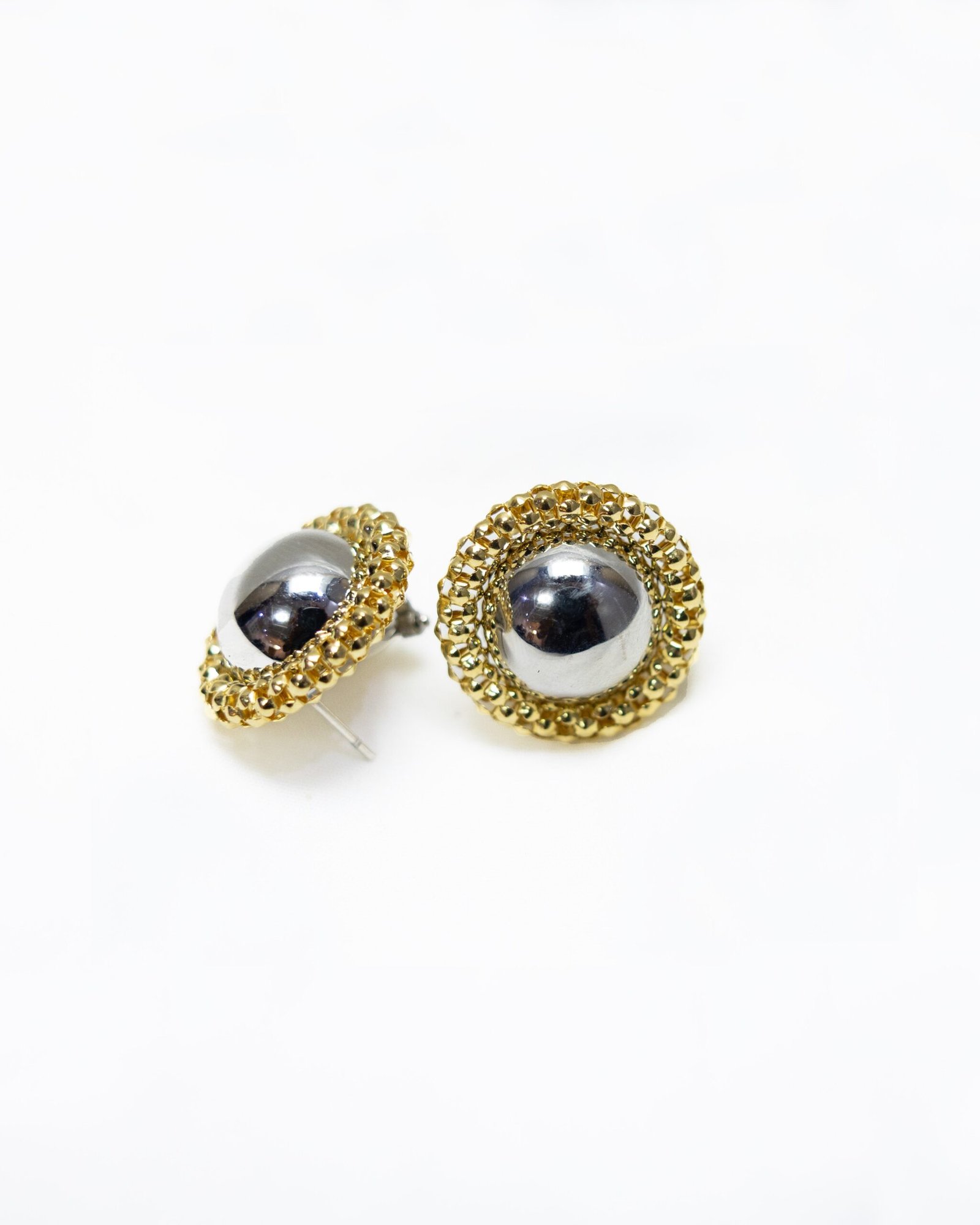 White gold earrings with gold trimmings