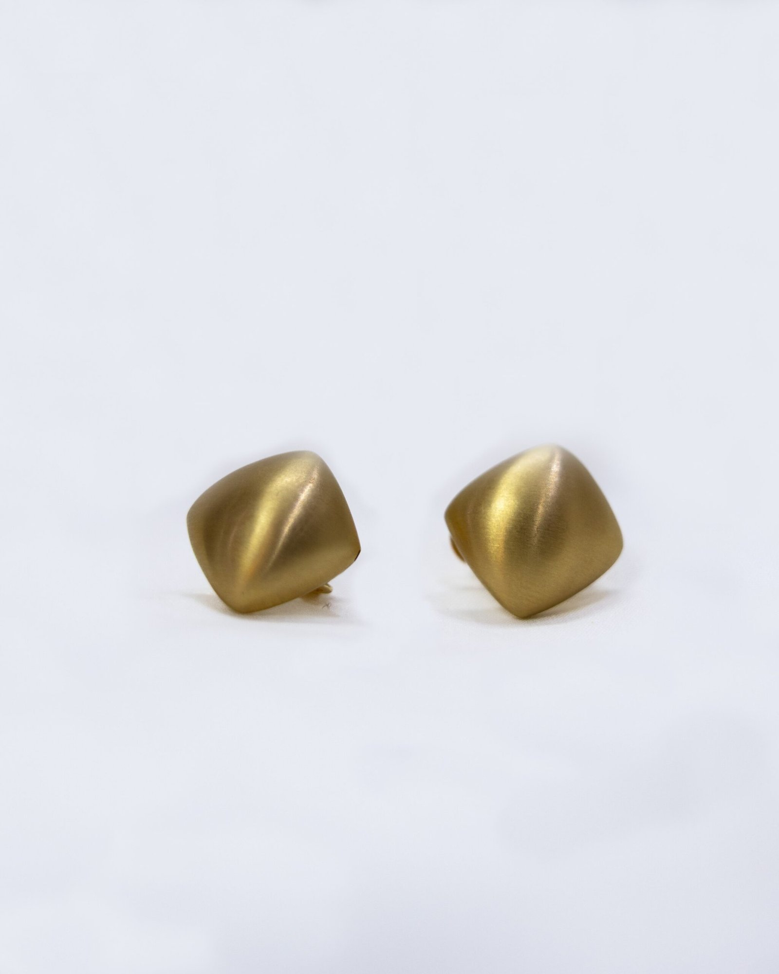 Diamond shaped matte studs