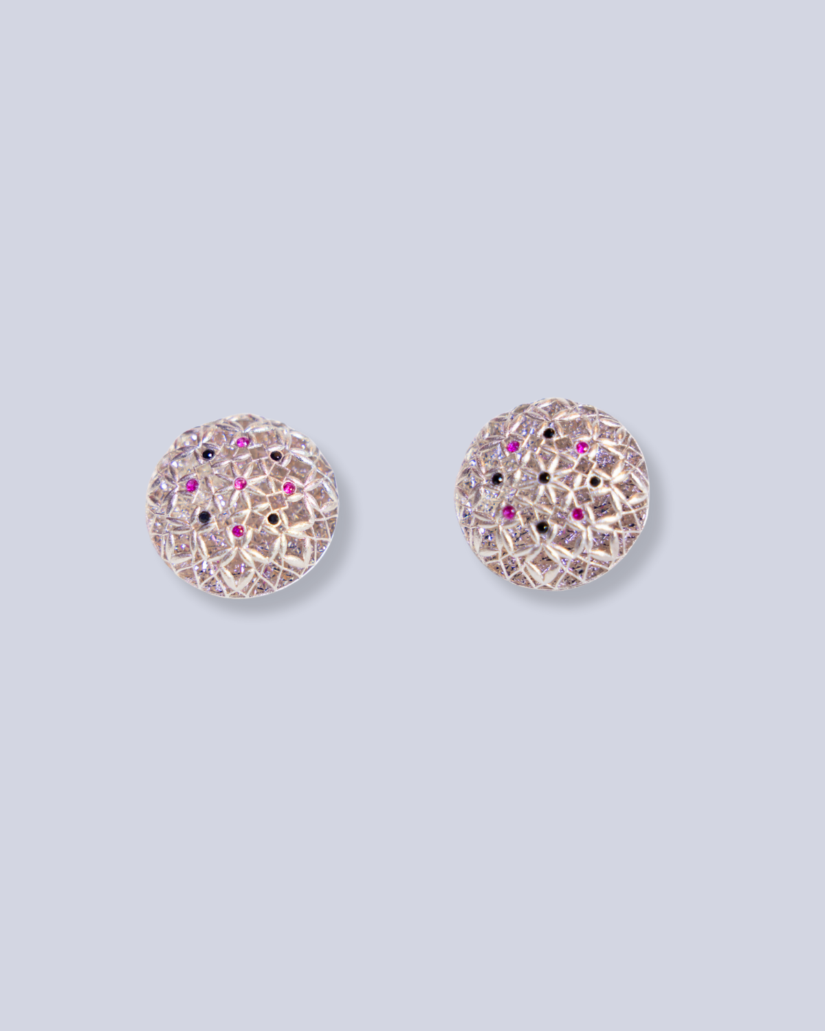 Exaggerated studs with colored dots