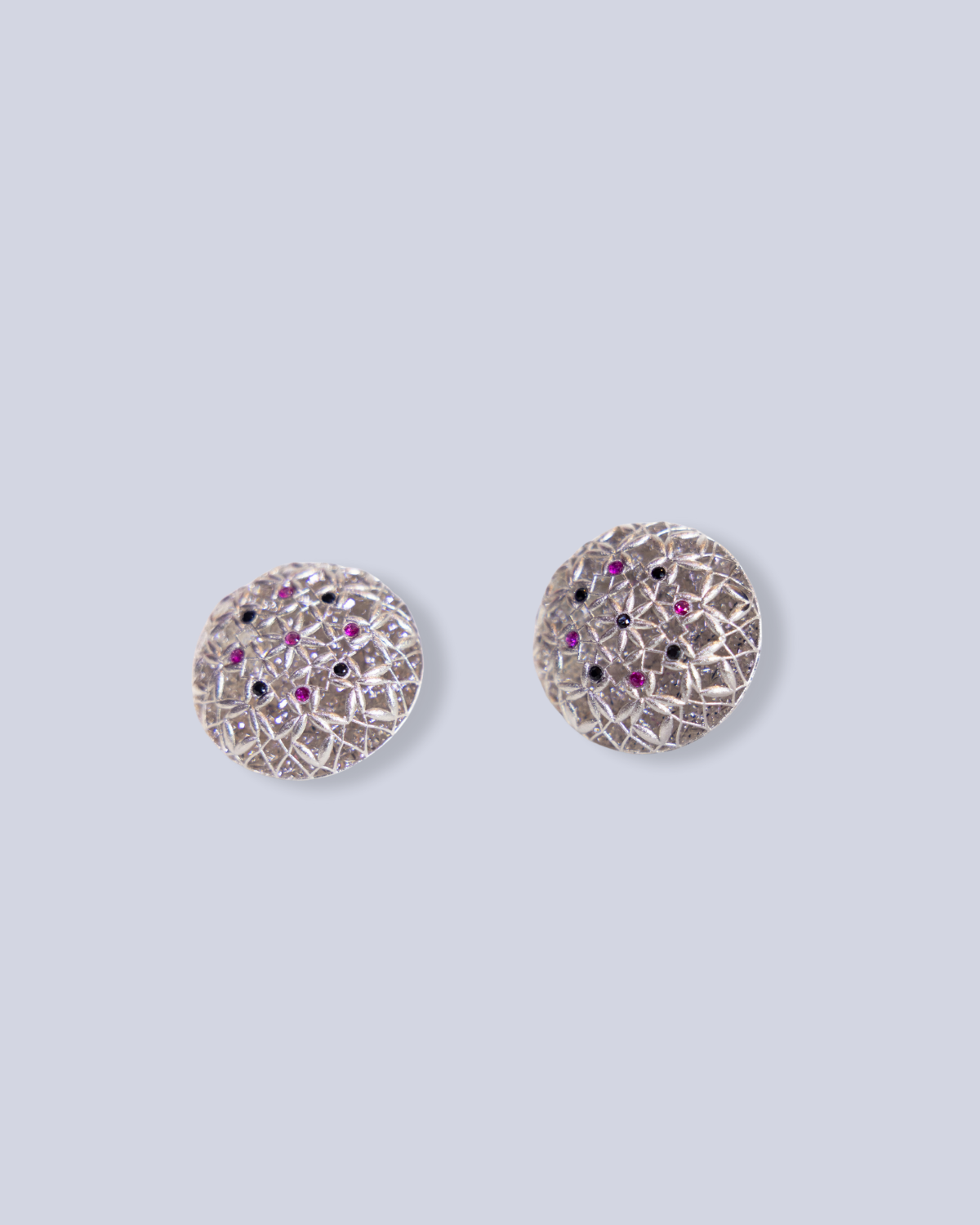 Exaggerated studs with colored dots