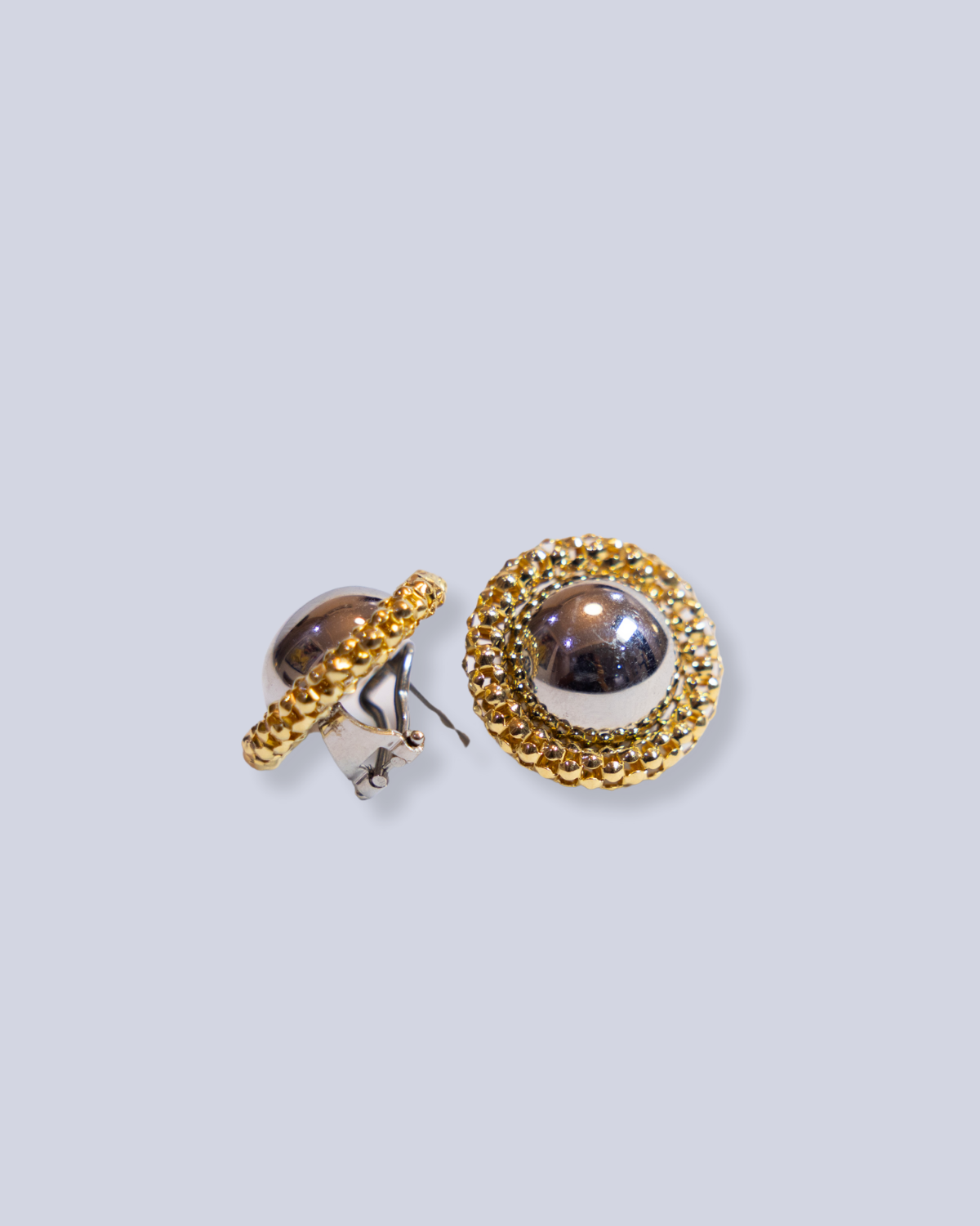 White gold earrings with gold trimmings