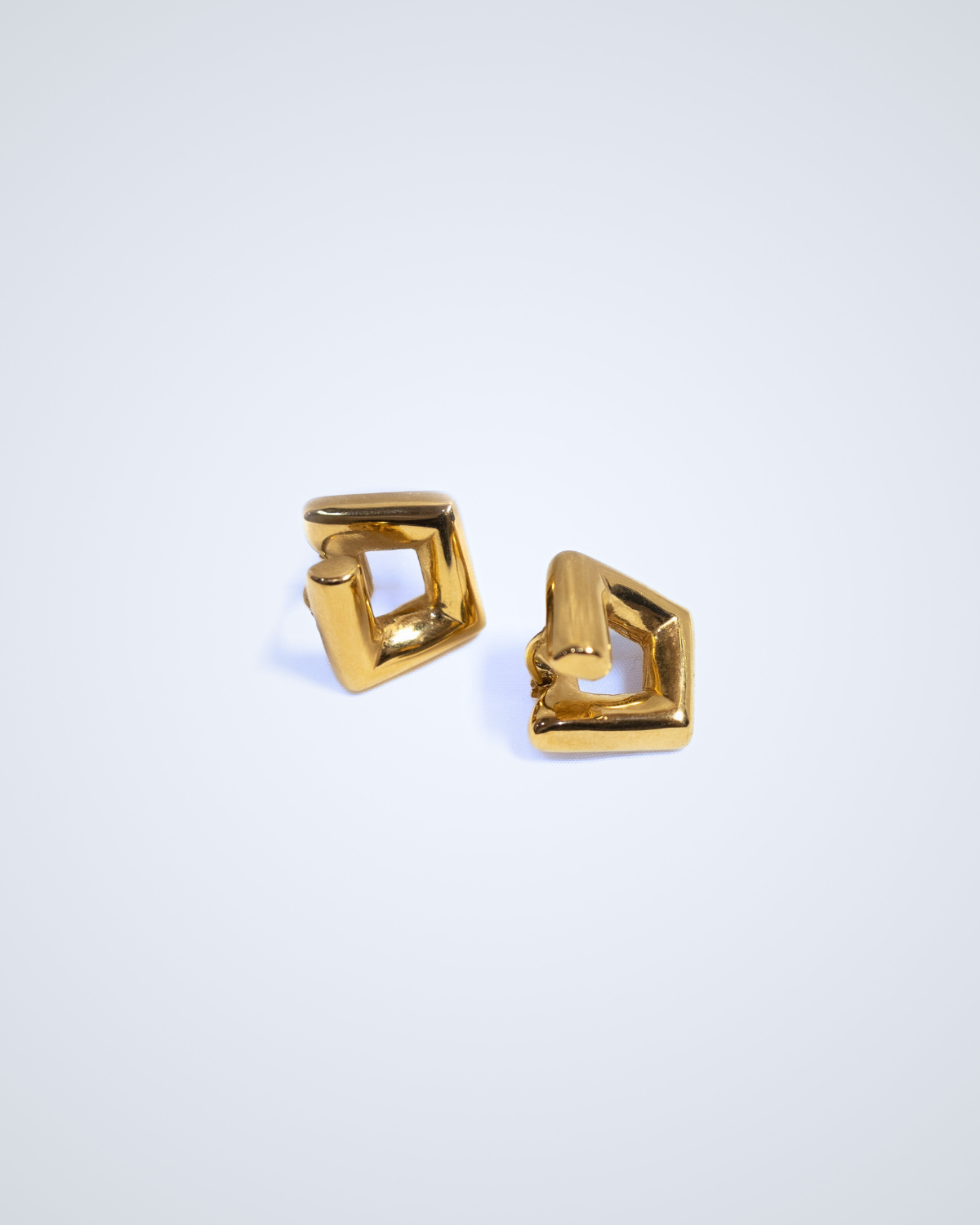 Irregular shaped gold earrings